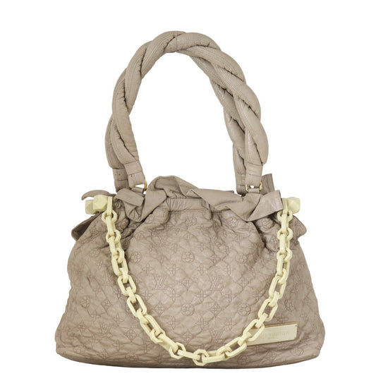 Louis Vuitton  Stratus Monogram Olympe