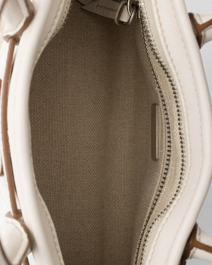 Prada Bonnie small printed linen and leather handbag - White - detail